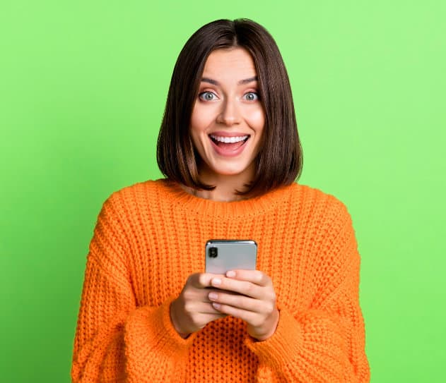 brunette girl facing camera looking excited